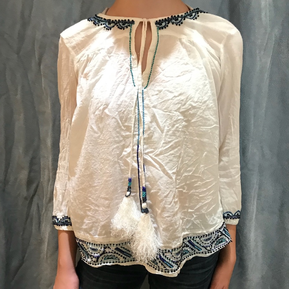white beaded boho shirt